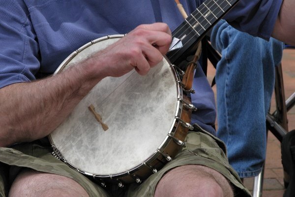 A man playing the banjo.