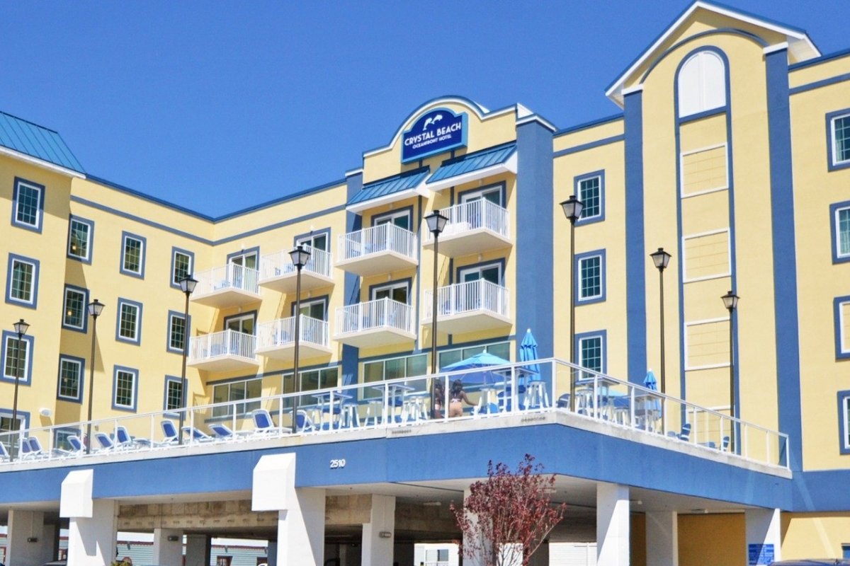 a hotel with a blue and yellow roof