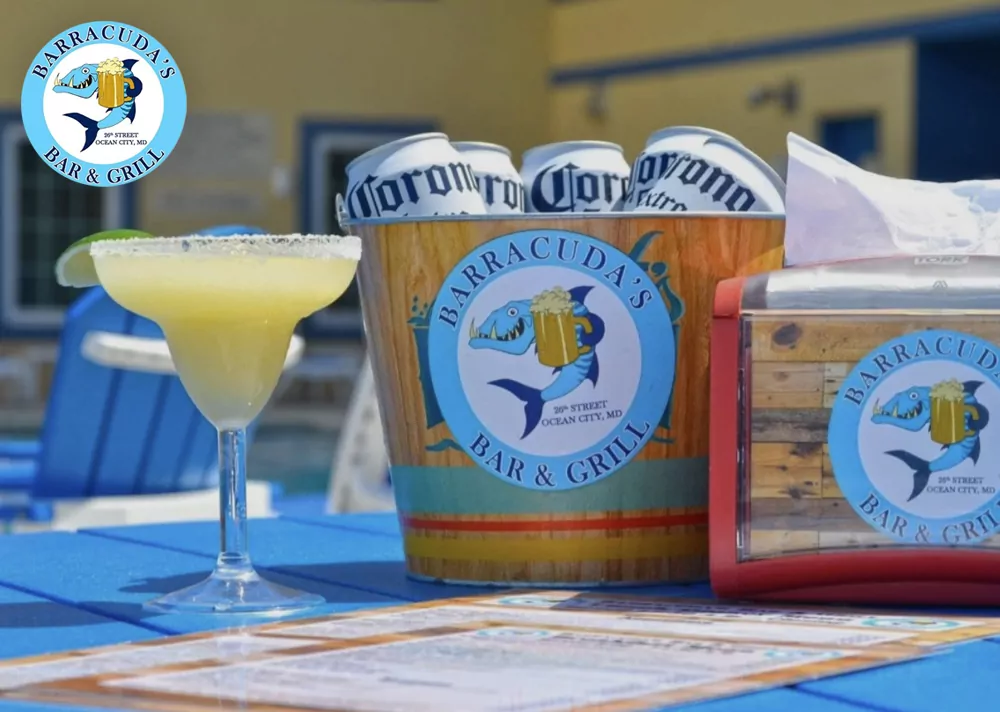 three buckets of drinks sitting on top of a blue table